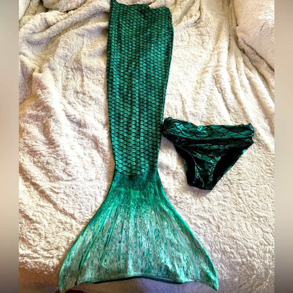Girls size 8 mermaiden mermaid tail and mermaid swim bottoms.